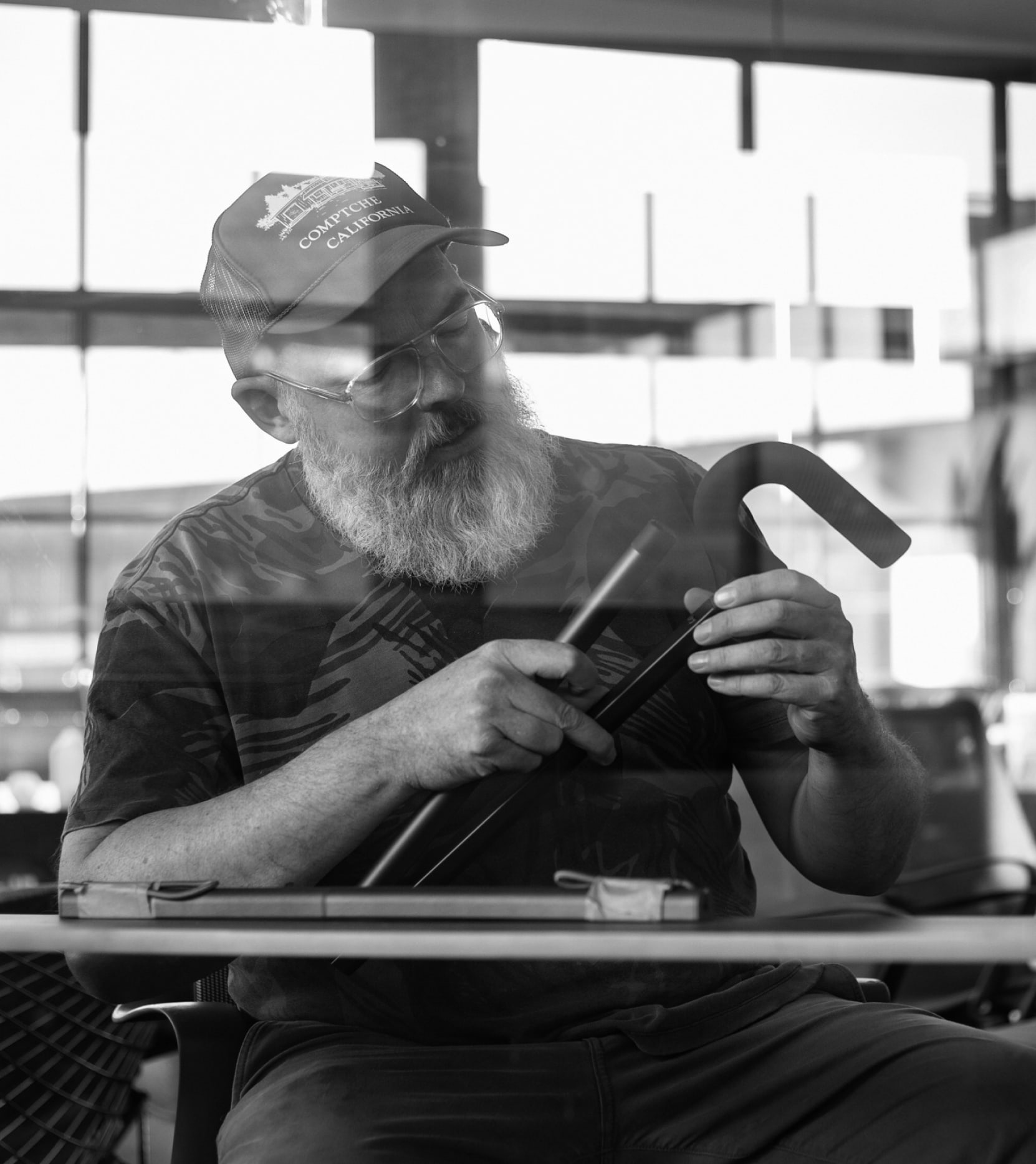 A craftsperson assembling the Rise cane